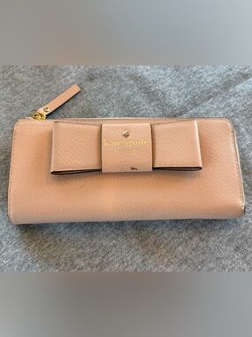 kate spade pink bow zip-around leather wallet